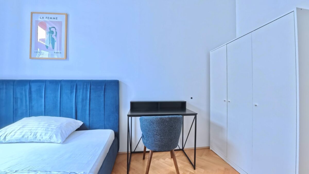 Desk, closet and bed