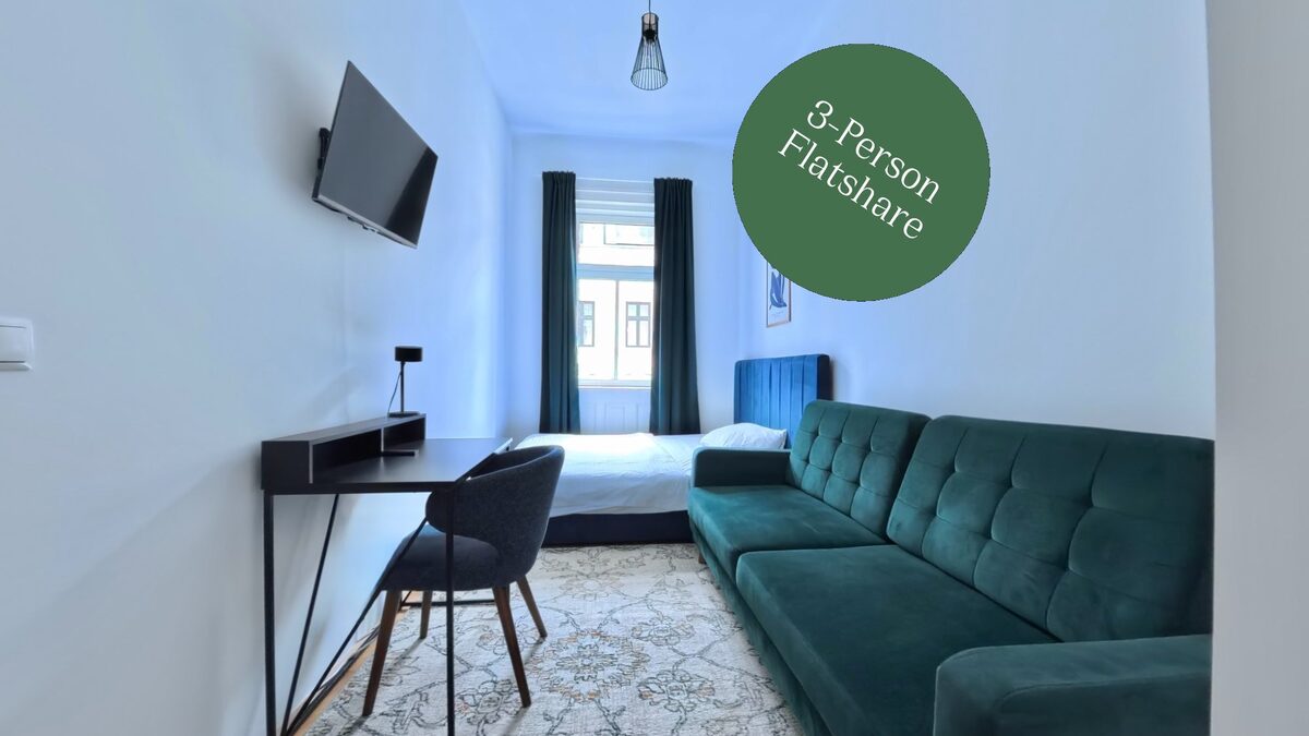 Select + Room with sofa and TV